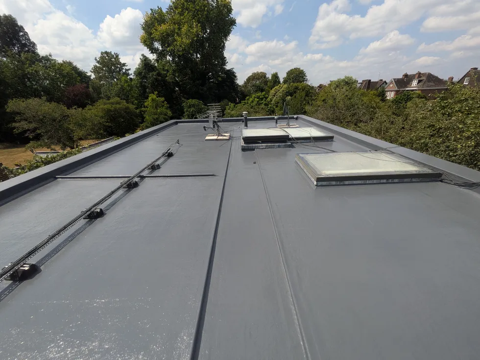 Fibreglass flat roof overlay in progress in Putney