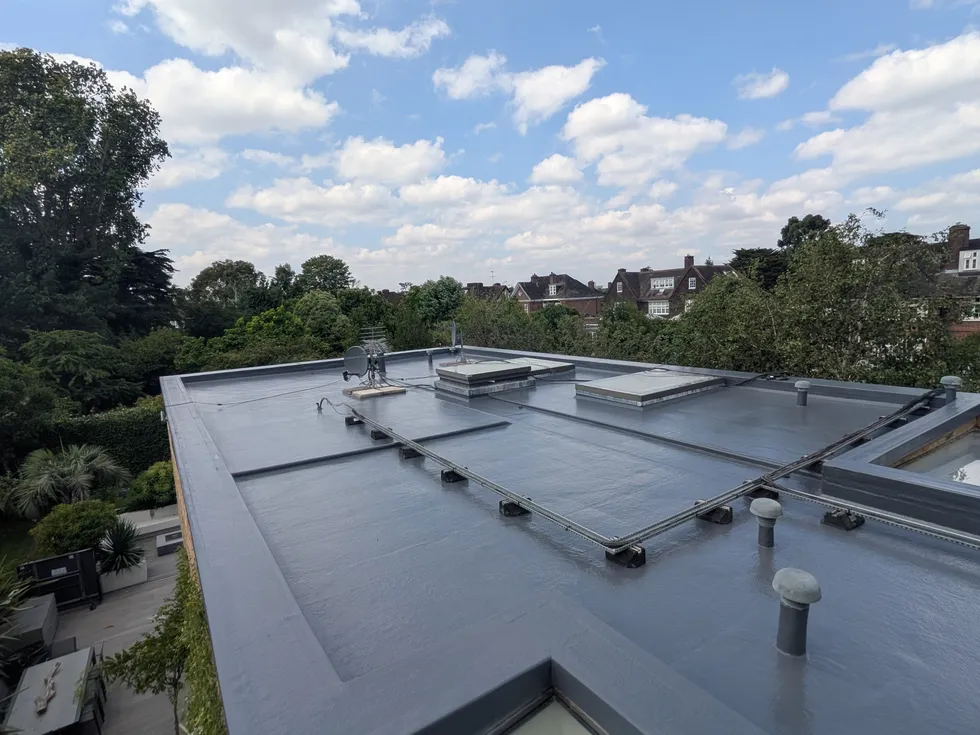 Completed seamless flat roof overlay in Putney